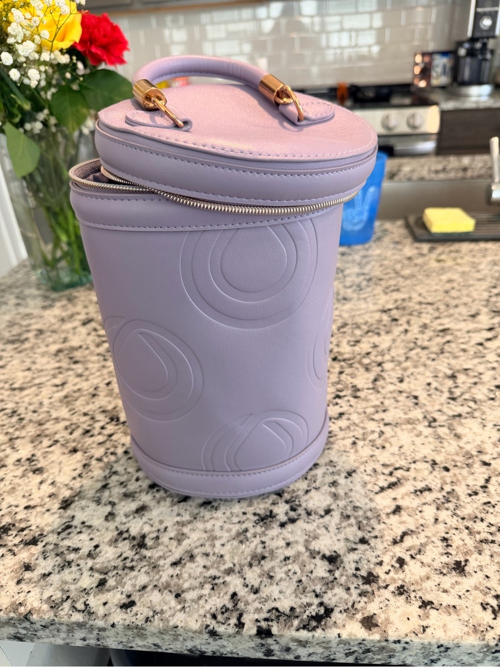 Monat Lavender -Embossed Round Vanity Bag w samples pack’s